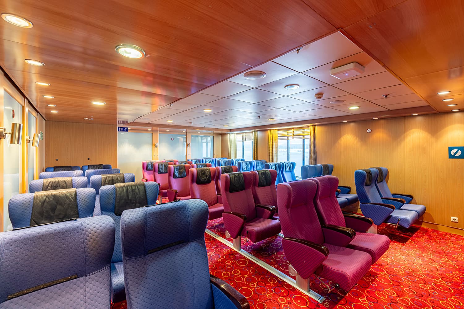 Reserved reclining seats in a quiet onboard lounge